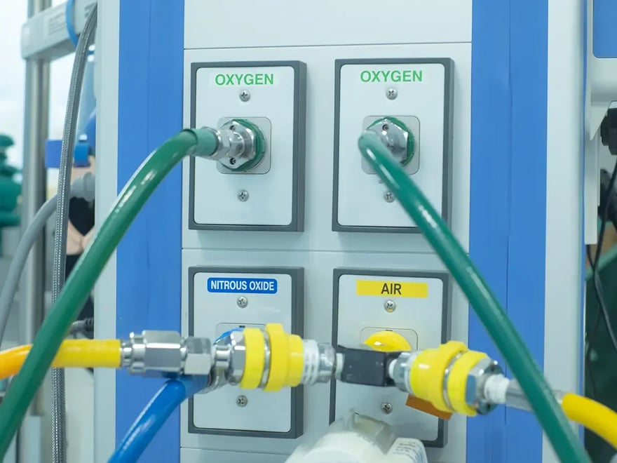 Medical gas supply panel with oxygen, nitrous oxide, and air outlets